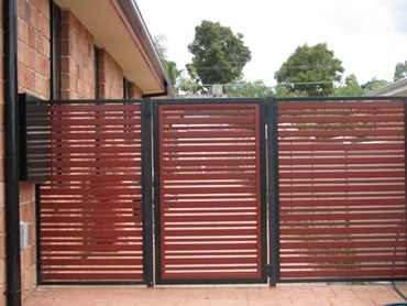Superior-Steel-Aluminium-and-COLORBOND-Steel-Fencing-and-Gates Red Driveway