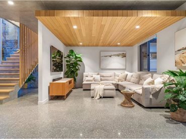 The interiors blend the elements of Geostone polished concrete and American oak timber