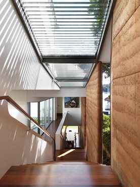 Glass skylights and louvers are strategically placed to capture and control sunlight