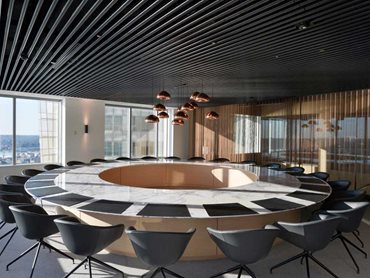 The Tubeline ceiling evokes a sleek and forward-thinking dynamism 