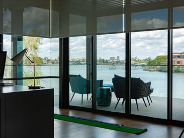 The blinds met the architect’s goal of maintaining the site’s impressive views to the river and the city beyond