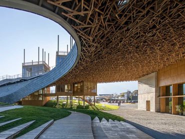 The partly sunken landscaped spaces underneath the cantilevered structure promise an experiential journey for visitors
