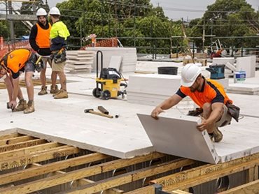 MaxiFloor being installed in a new apartment block in Preston, SA (Photographer: Mannix Photography)
