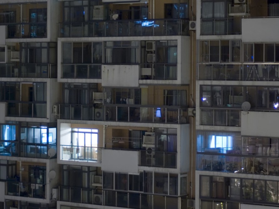 Vacant and unlit &#39;ghost&#39; apartments are a source of public outrage in major cities around the wold
