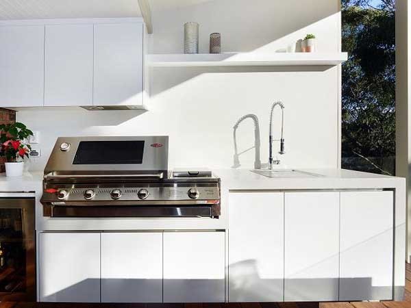 An outdoor kitchen by Granite Transformations