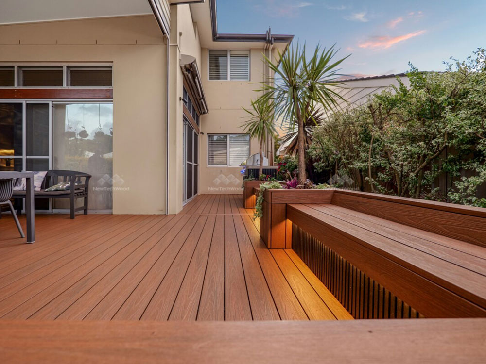 NewTechWood US49 Terrace Decking in Teak and NewTechWood UH61 Castellation Cladding in Ebony