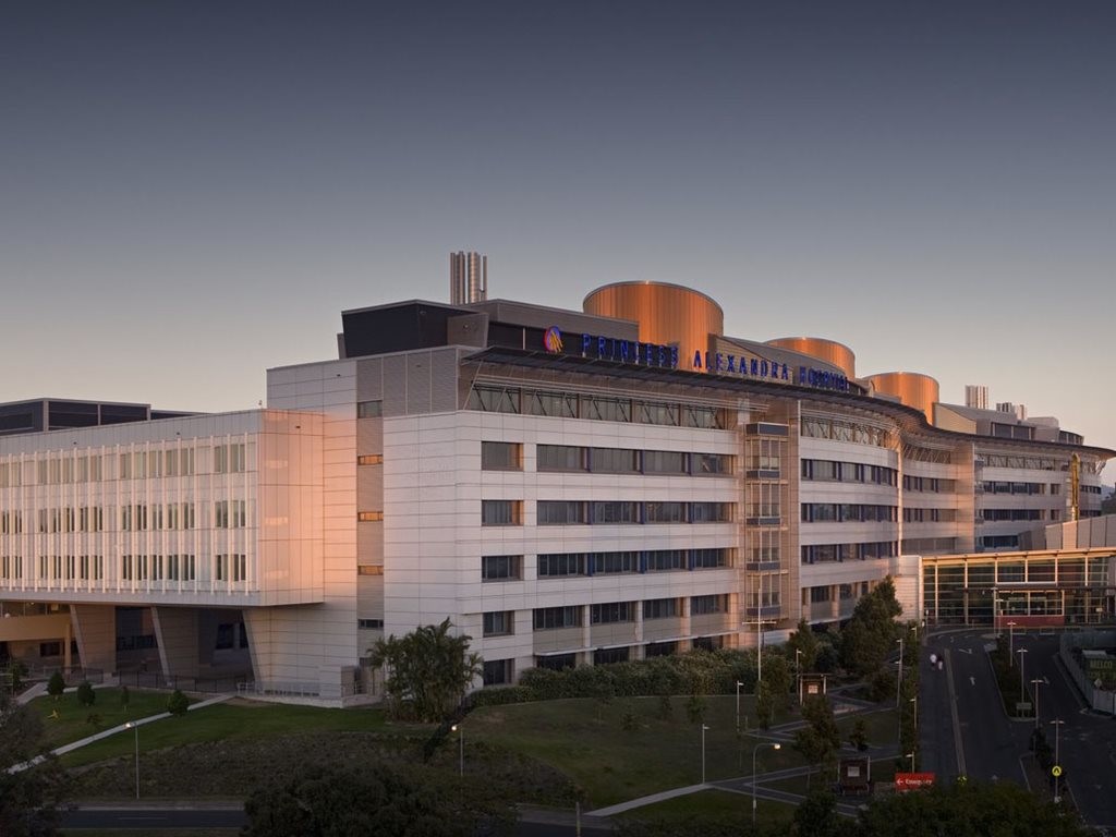According to Queensland Public Works minister Mick de Brenni, it could take until early 2019 to completely remove and replace all the external façade cladding on the Princess Alexandra Hospital, which has been identified as being potentially flammable. Image: Cox Architecture

