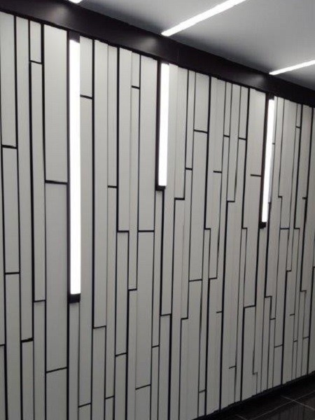 MAXI Film White custom cut wall panels by Gray Puksand Architects
