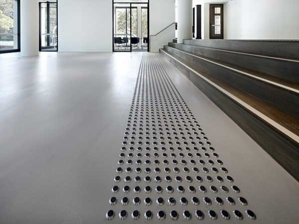 A grey PanDOMO FloorPlus product 10/3.1 was used in the Urbanest application