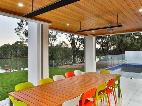 The alfresco area of the Murray River home featuring Heatstrip Classic heaters

