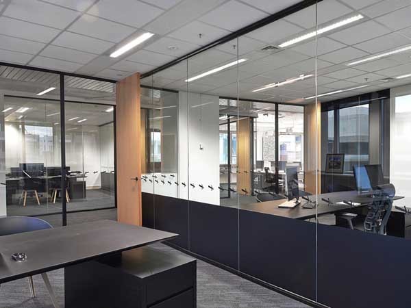 Exposed ceilings and glass partitioning were selected to provide an open airy feeling
