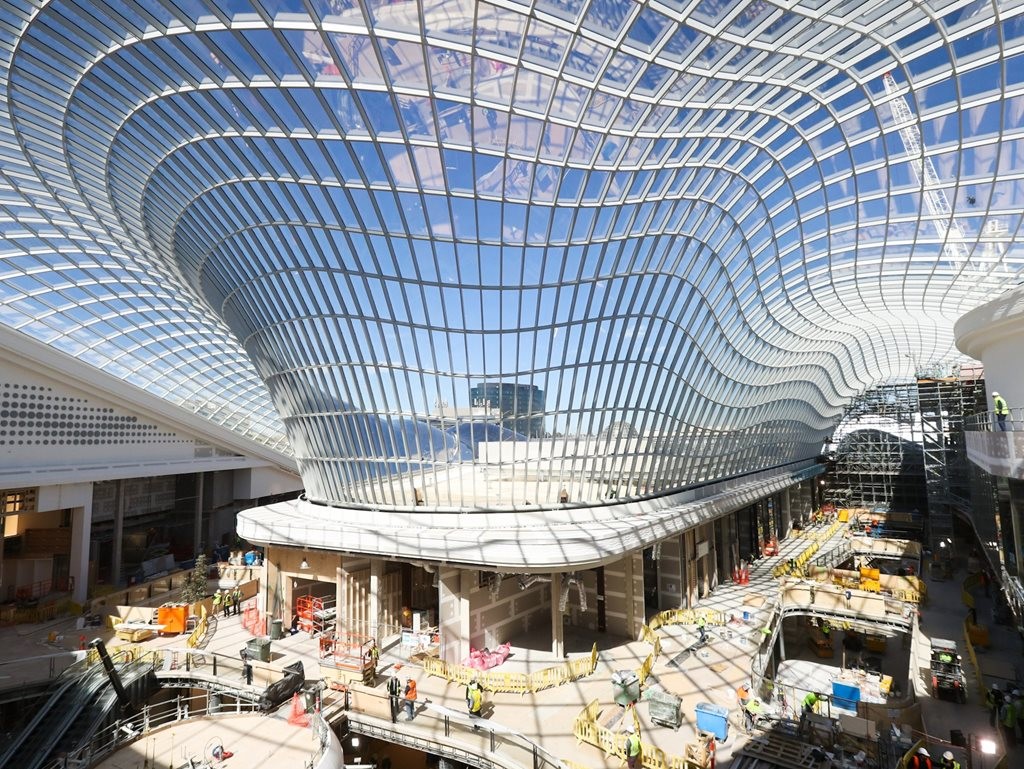 The glass gridshell roof will form a canopy of light over the shoppin centre
