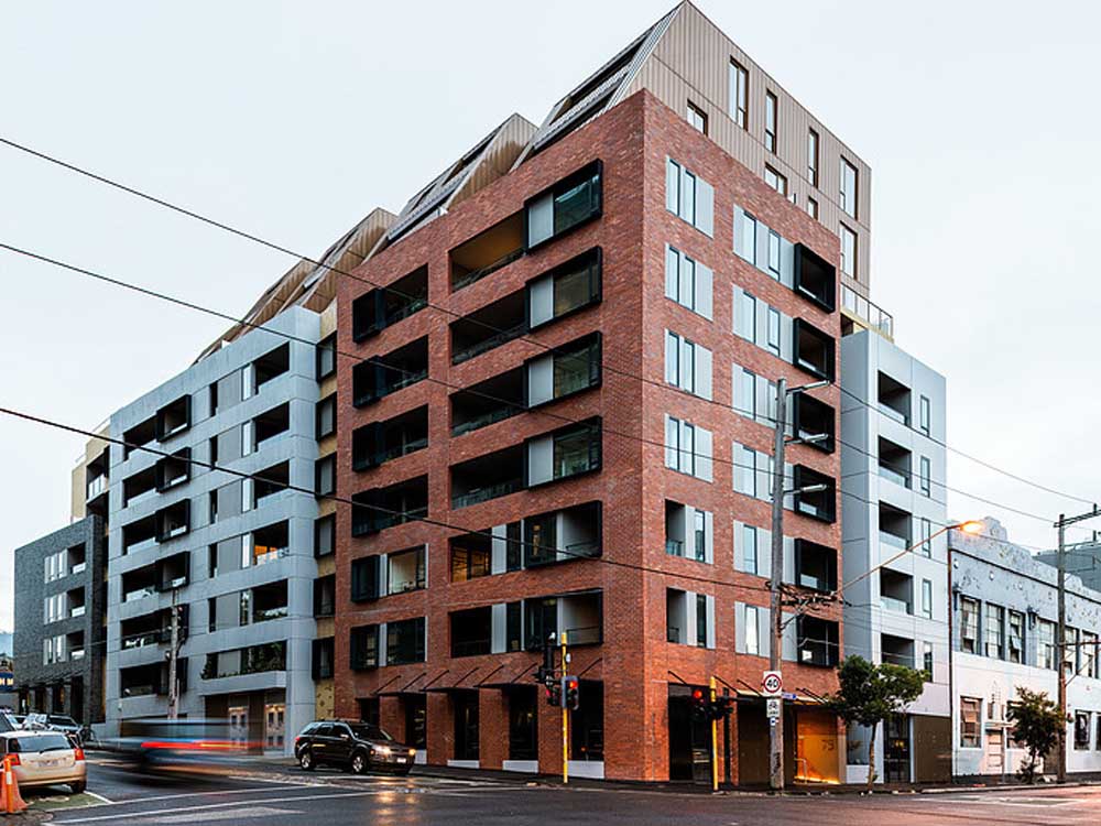 Signature facade on Collingwood apartments features brick inlay - Architecture and Design