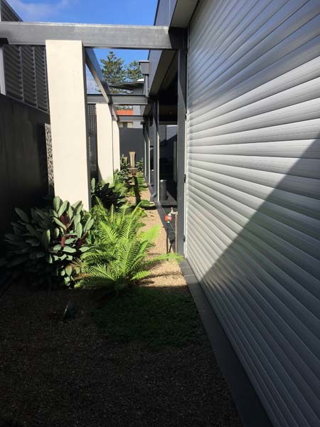 The roller shutters were required to weatherproof the outdoor gaming rooms
