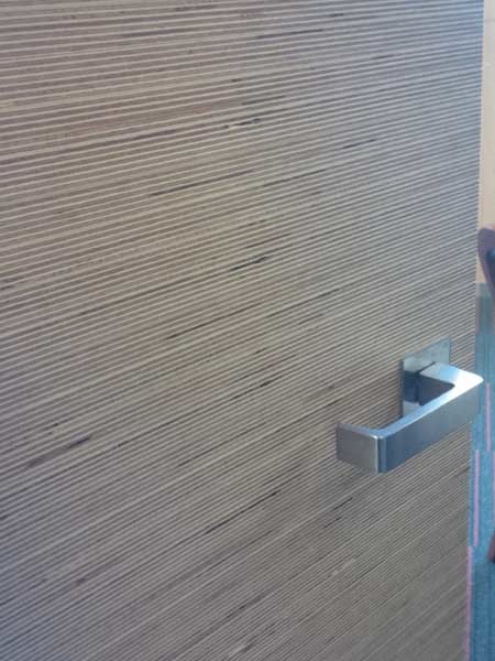 The Langwarrin Hotel door featuring MAXI Edge panels with a crossgrain effect