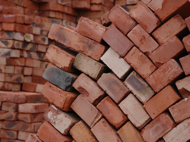 A Melbourne scientist has developed a lightweight brick product that traps the toxic chemicals found in cigarette butts. Image: Flickr / restlessglobetrotter
