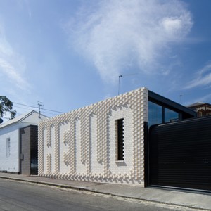 Brick wall typography allows Victorian house by OOF! Architecture to literally say hello 