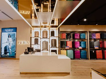 The completed store features black and gold metal finishes 