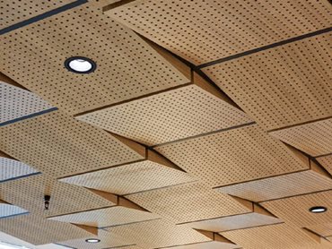 The custom timber wedge ceiling 