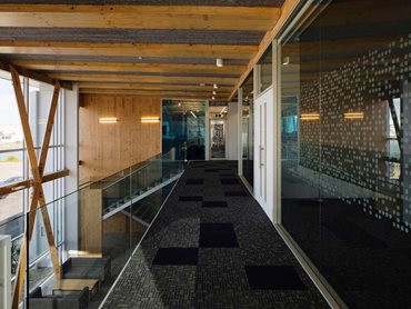 Much of the mass timber is clear finished, delivering warmth and ambience to the interior spaces