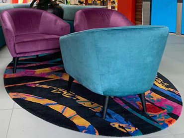 A vibrant pop of colour on an otherwise neutral floor