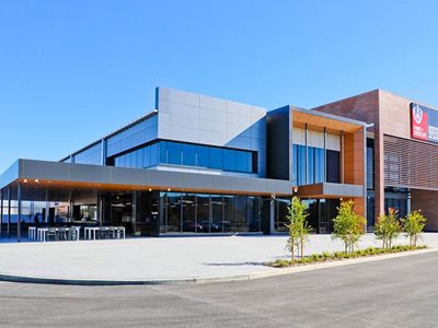 Exterior building facade with honeycomb panel