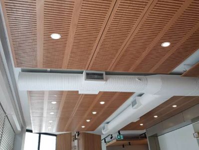 timber ceiling panels integrated lights office interior