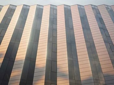 The BIPV system at 550 Spencer will feature solar panels of the same thickness and appearance as conventional glass facade panels