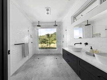 For design consistency, matte black tapware, shower outlets and accessories have been used throughout all the bathrooms
