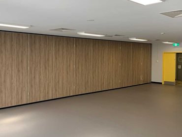 A Bildspec operable wall separating the large function/meeting area into two smaller event spaces 