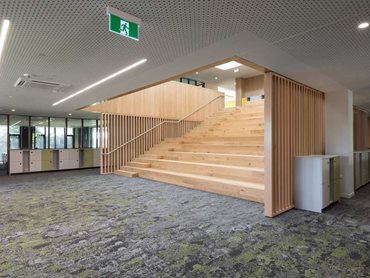 The school's flooring featured a selection of carpet planks, offering a distinctive pattern with complementary pops of green, yellow, red and white