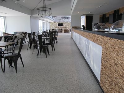Cafe interior featuring resin flooring