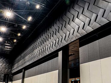 Autex’s custom 3D Tiles span all four walls of the 3600sqm exhibition hall
