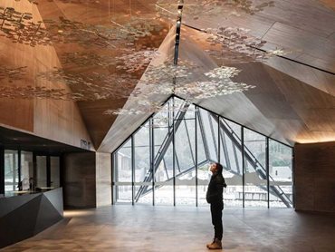 The design is inspired by the endemic snow gums whose draped canopy creates an interstitial space that provides protection to underlying flora and wildlife