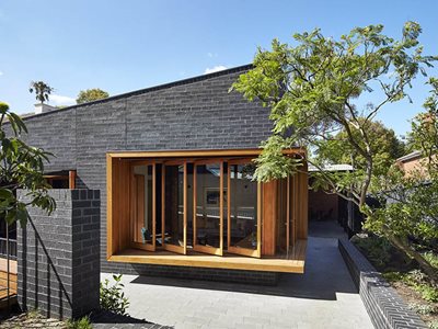 residential home black bricks timber windows