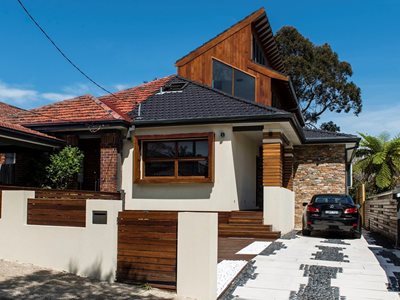 Exterior view of house with terracotta roof tiles 