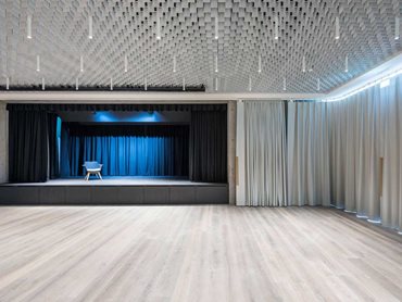 Events space: LIVA ceiling's white blade louvres, arranged at right angles to one another, create a ceiling with a homogeneous and bright look and feel