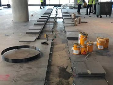 The substrate required an epoxy repair mortar to reinstate the structural design intent of the concrete slabs 
