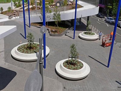 SVC Circular Concrete Planters Pedestrian Walkway Blue Poles