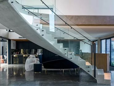 Glasshape’s signature TemperShield bent & toughened clear architectural glass was used to create the curved staircases