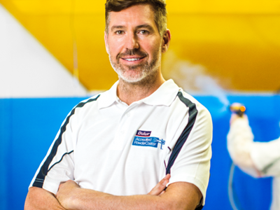 Portrait of Dulux Accredited Powder Coater With Arms Folded