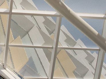 Futuristic Collection round-end profile perforated metal panels at University of Newcastle NUspace project