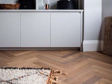 The Herringbone Collection of engineered timber flooring has helped transform the space in a stunning way 