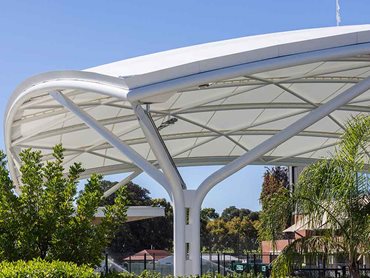 The 1400m² PTFE membrane roof includes gutters and fascia, roof safety lines, access hatch, siphonic system and downpipes