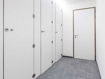350 custom Alpaco toilet partitions were installed to create the illusion of an individual environment with guaranteed privacy