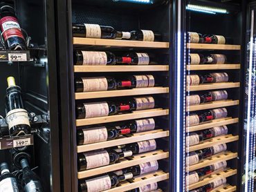 Wine cabinets from Vintec's 'Noir' borderless black glass range