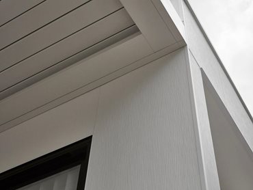 Cladding combination of Hardie Brushed Concrete Cladding and Axon Cladding