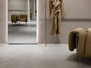 X-Bond Microcement in ‘Umber’ colour complements the signature neutral palette of the brand