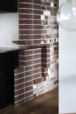 Recycled bricks were used to create the interior feature walls in the apartments. Photography by Brigid Arnott. 