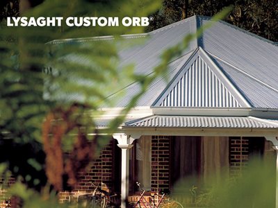 Lysaght Custom Orb Brick Residential Exterior Through Greenery